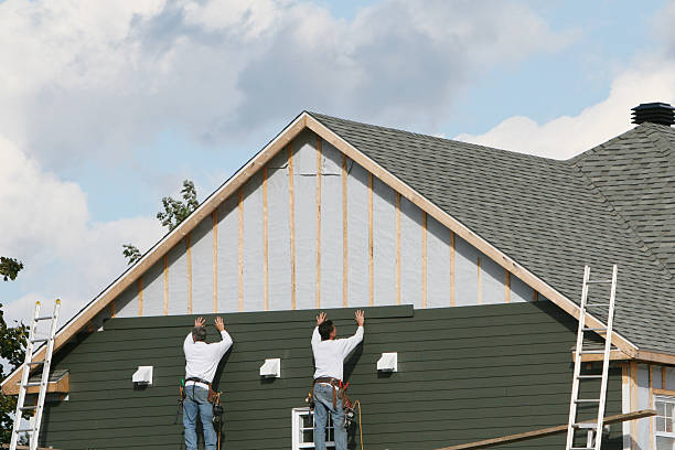 Professional Siding Replacement technician working in Bethpage, NY